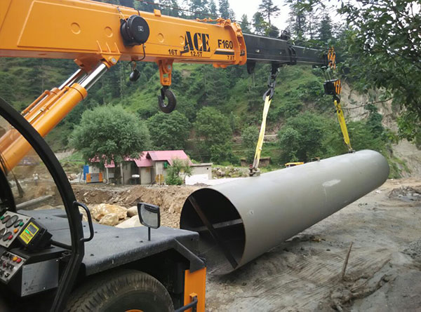 ACE Pick and Carry Crane Lifting Heavy Steel Pipe at Construction Site- Model F160